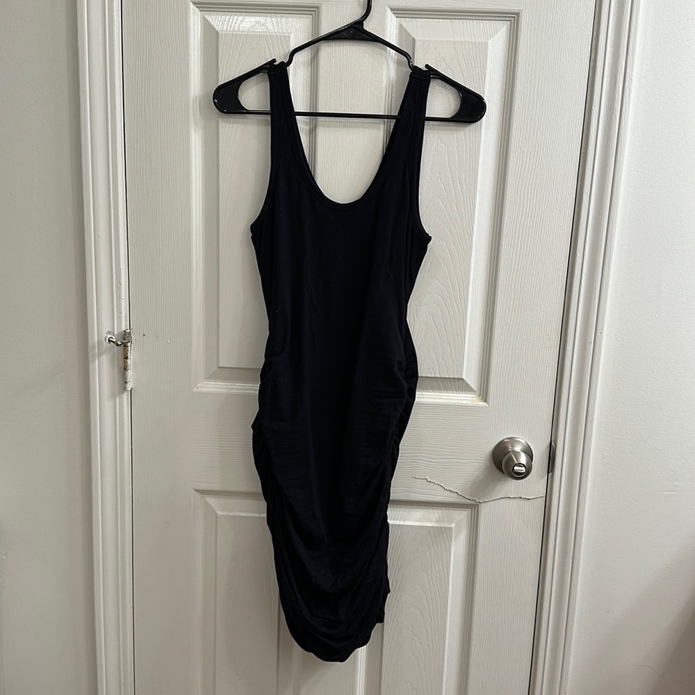 Black rouged express dress, size small, good condition.